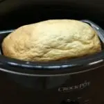 easy crock pot bread recipe bread baking in a black crock pot