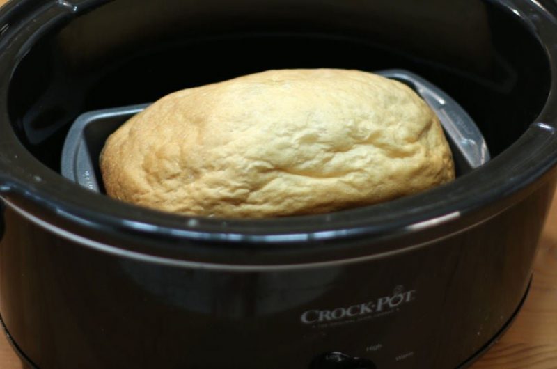 easy crock pot bread recipe bread baking in a black crock pot