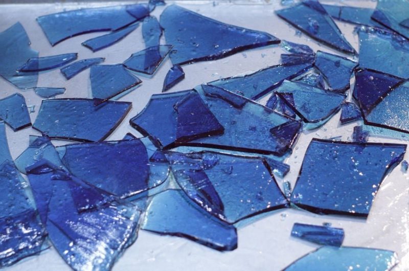 blue edible sugar glass on silver sheet pan