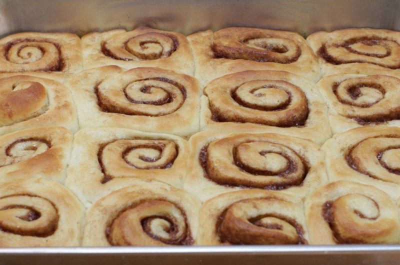 no knead cinnamon rolls recipe in a large baking pan