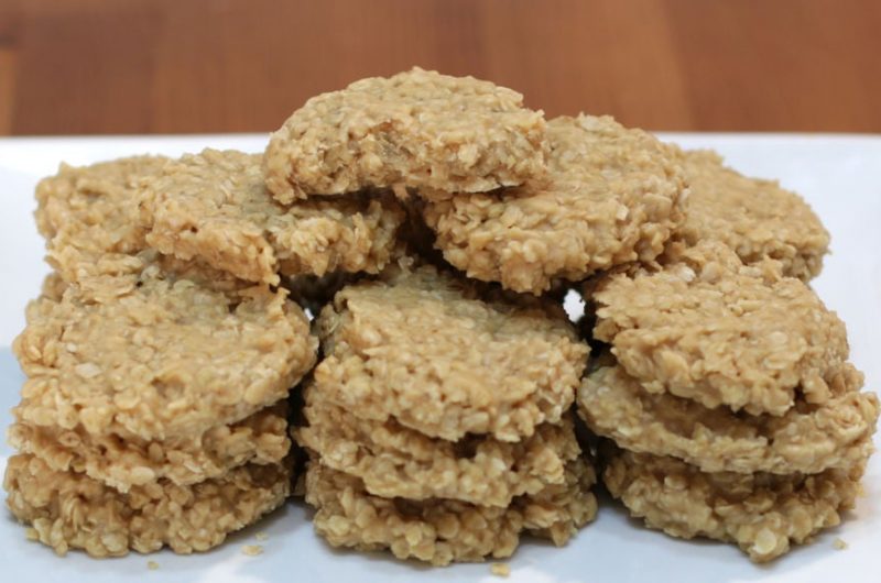 No-bake peanut butter cookies stacked on a plate