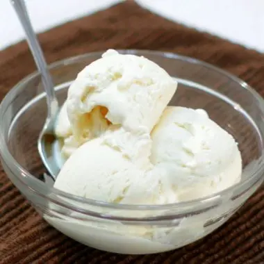 3 ingredient homemade vanilla ice cream in a bowl on a brown towel