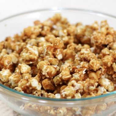 caramel popcorn in a large glass bowl