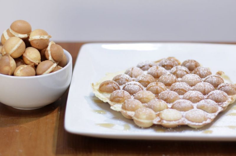 homemade bubble waffles on a wooden table