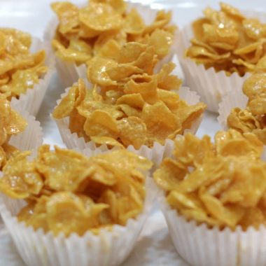 Eight honey joys on a white plate