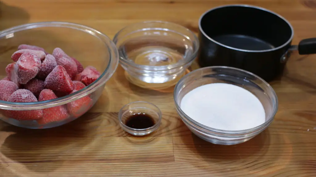 Strawberry Sorbet Recipe {No Machine} | In The Kitchen With Matt 3 Simple syrup in a pot on the stovetop.