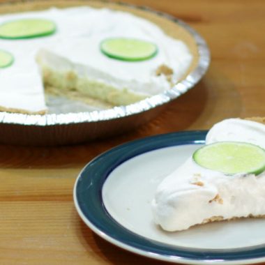 easy homemade key lime pie on a wooden table.
