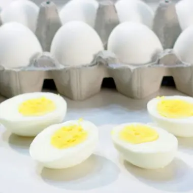 perfect hard boiled eggs on a white plate