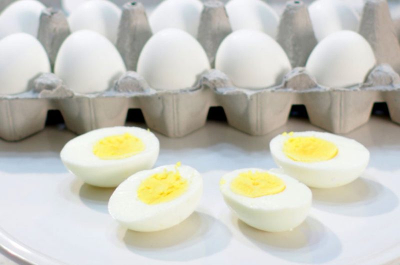 perfect hard boiled eggs on a white plate