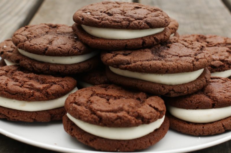 homemade whoopie pies on a plate on picnic table