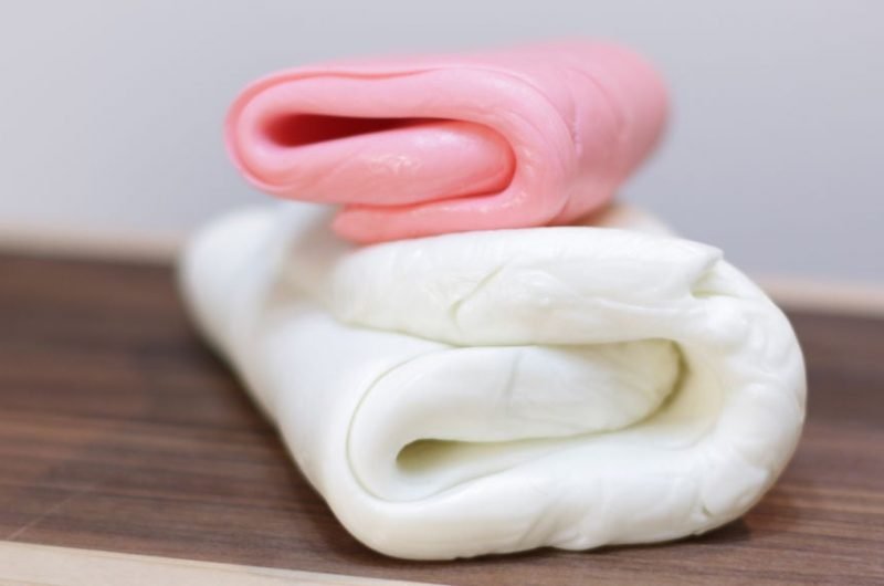 marshmallow fondant on a wooden cutting board.
