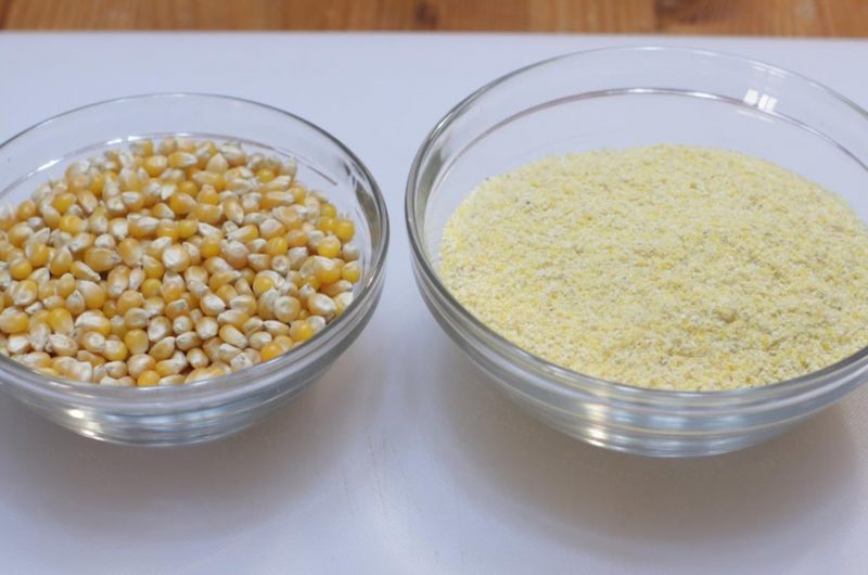 bowl of popcorn kernels next to homemade cornmeal
