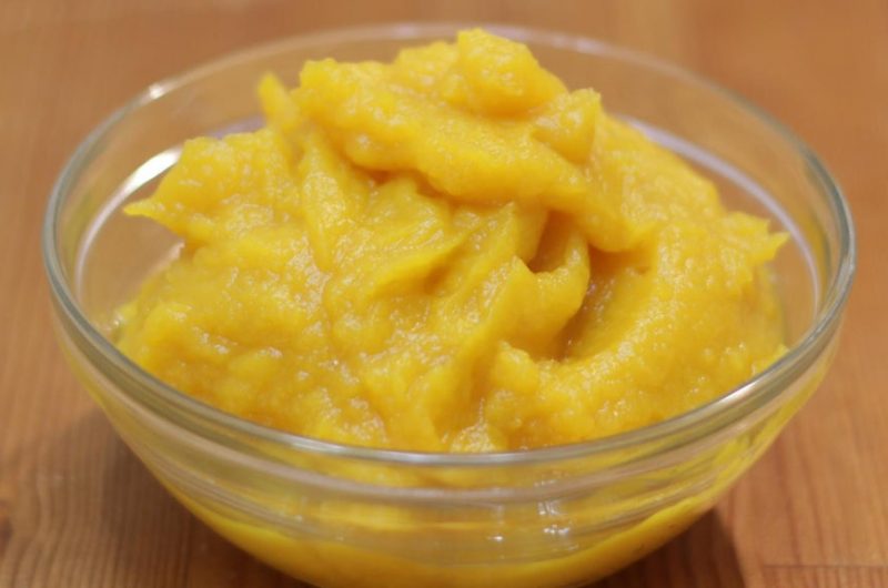 Glass bowl full of fresh homemade pumpkin puree