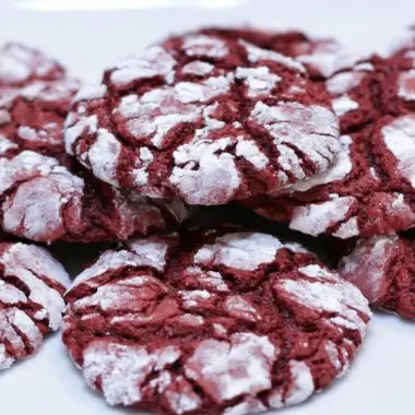 stack of red velvet cake mix crinkles on a plate