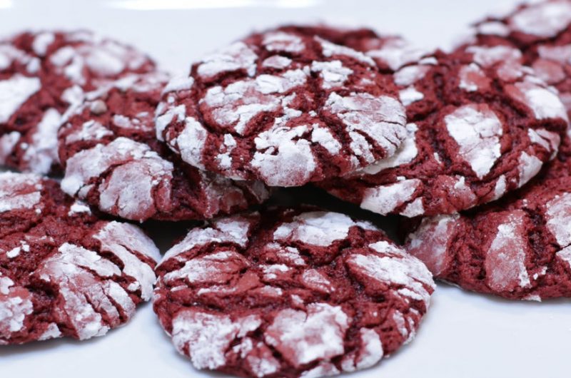 stack of red velvet cake mix crinkles on a plate