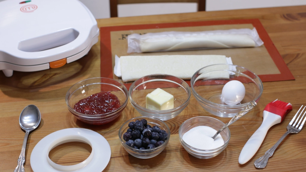 Several ingredients on a table in glass bowls.