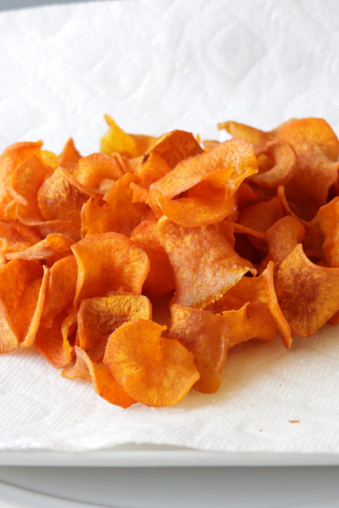 Pile of sweet potato chips on a plate