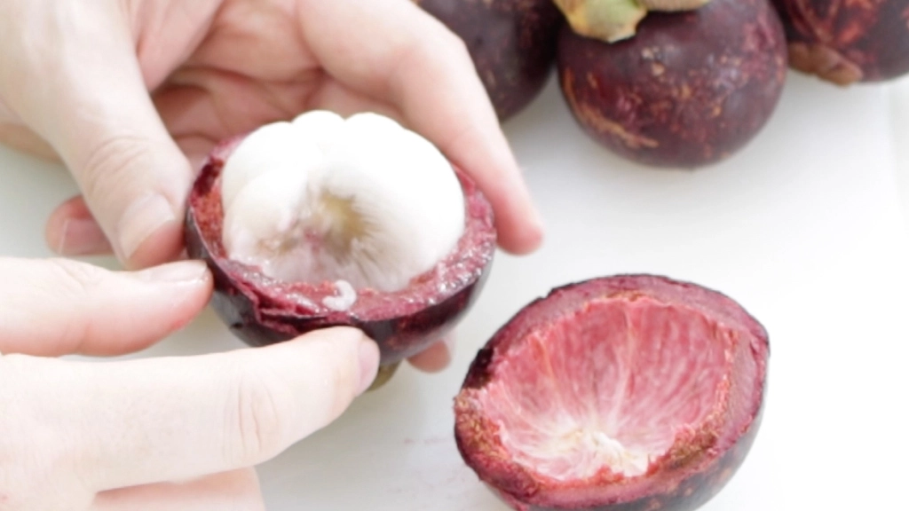 Eating a mangosteen