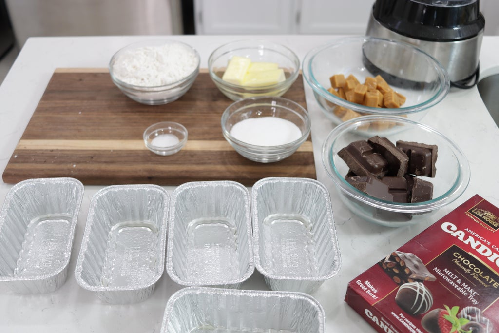 Several ingredients in bowls on a counter.