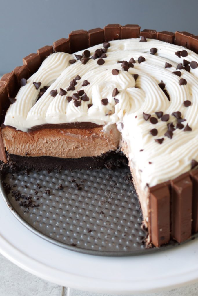 No bake chocolate cheesecake on a white plate.