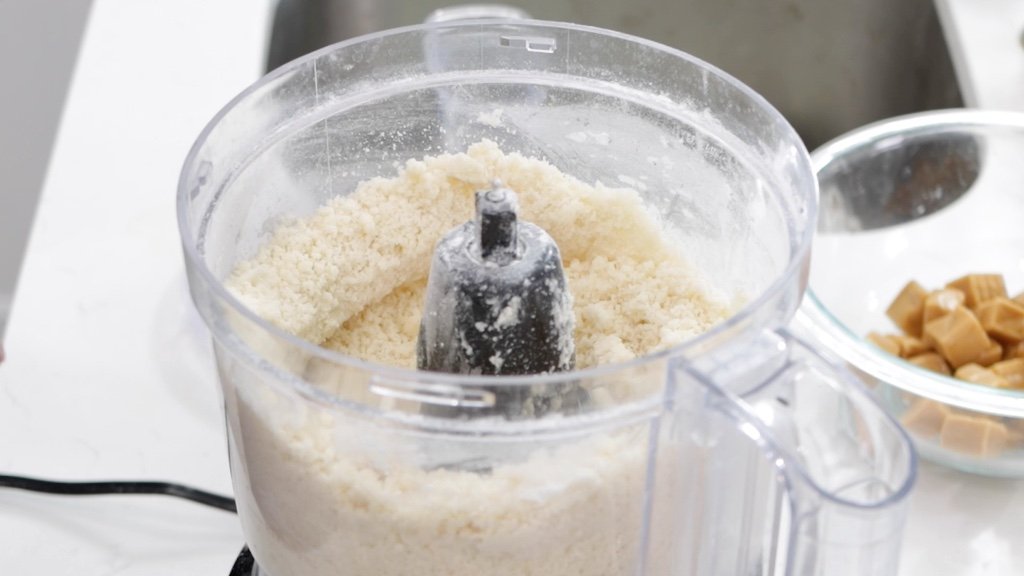 Shortbread cookie base in a food processor bowl