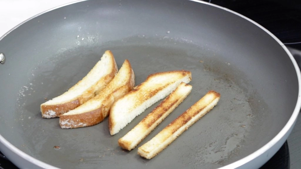 Toast sticks in a skillet
