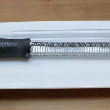 microplane zester on a white plate