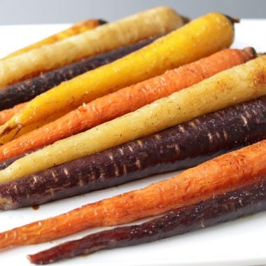 Plate full of roasted carrots with honey butter