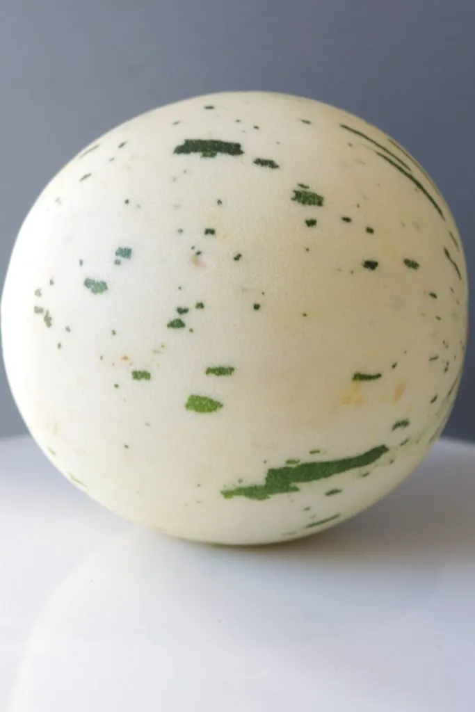 Full gaya melon on a white plate.