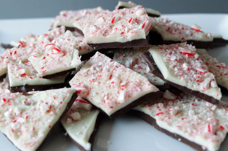 Pile of peppermint bark on a white plate