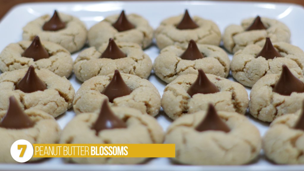 Plate of peanut butter blossoms number 7 on the top 8 peanut butter recipes list.