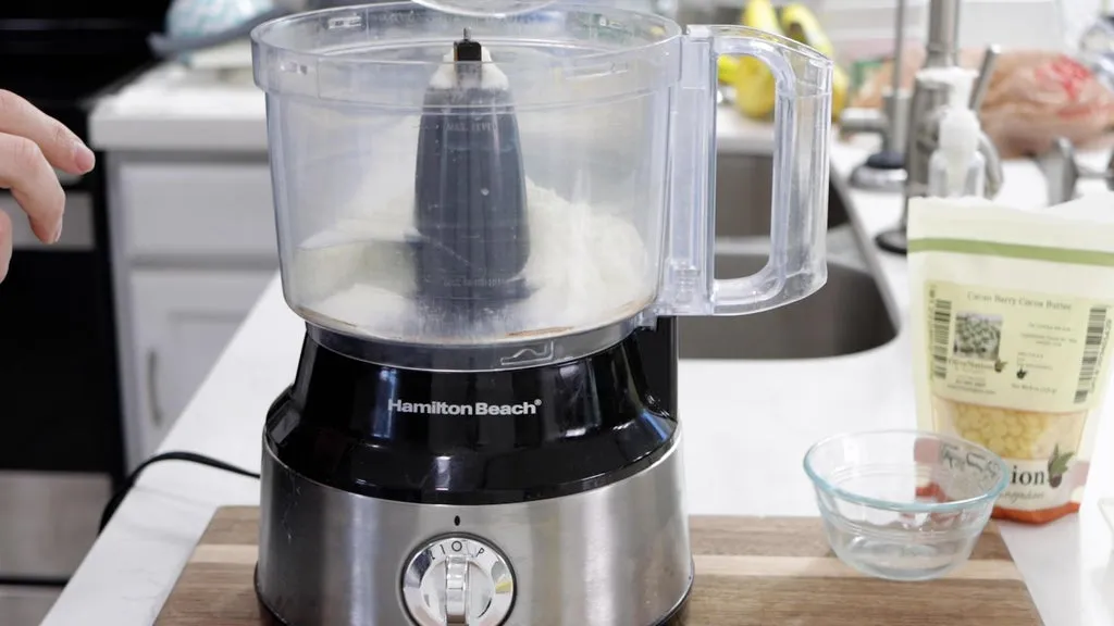 Milk powder and sugar in food processor.