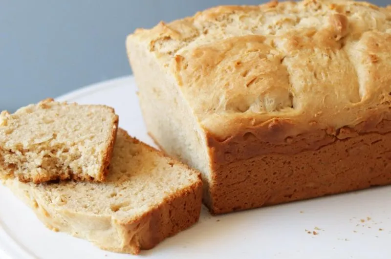Loaf of peanut butter bread on a white plate