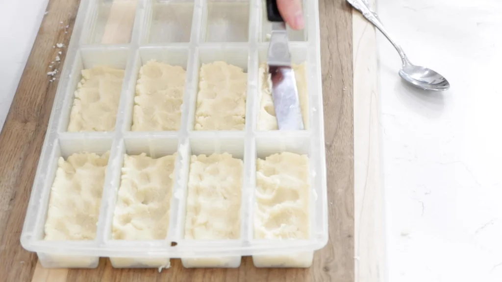 Shortbread cookies recipe dough in a candy bar mold.