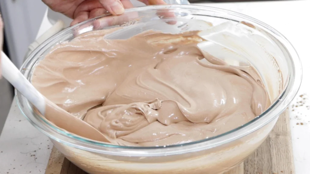 Large bowl of chocolate ice cream base.