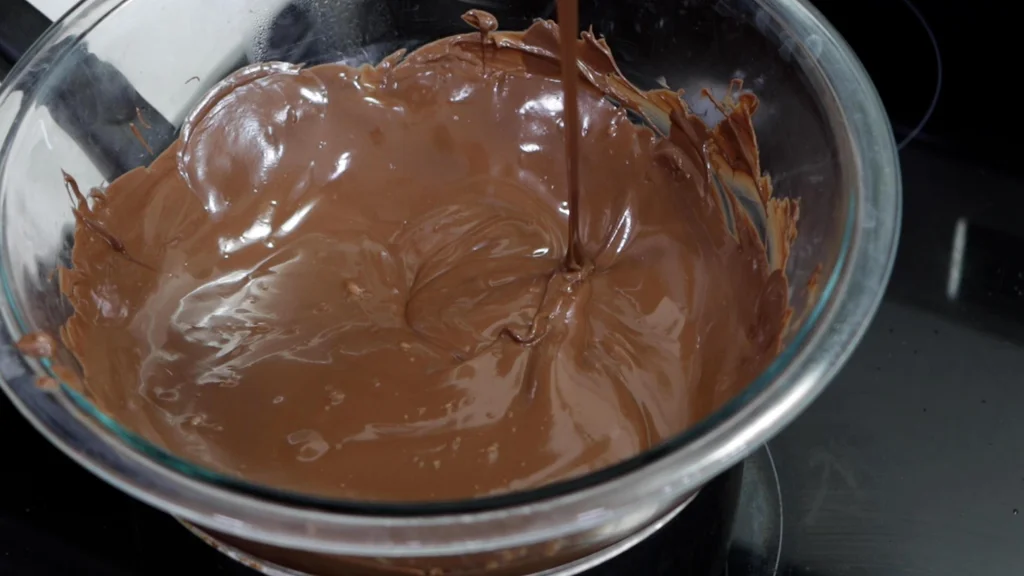 Melted chocolate in a pyrex bowl.