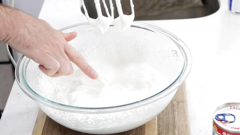 Large bowl of whipped cream.