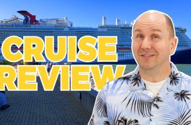 Matt standing in front of a cruise ship.