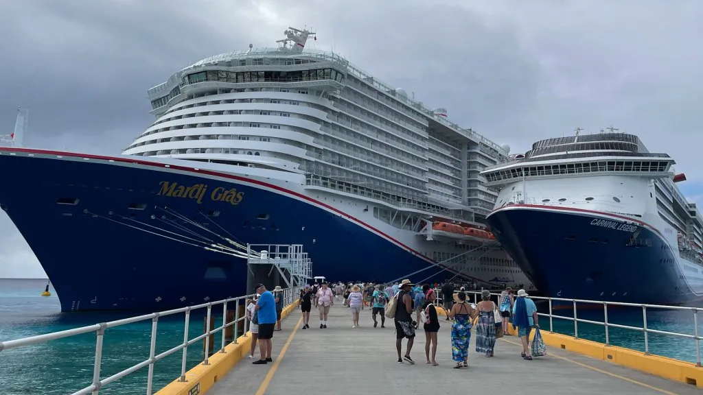 Carnival Mardi gras ship next to the carnival legend cruise ship