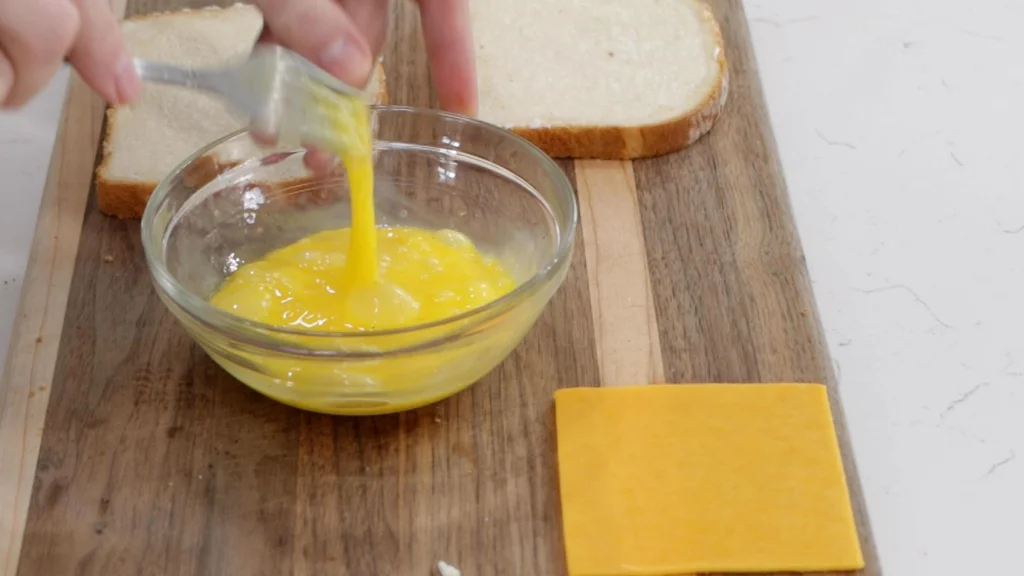 Eggs mixed in a bowl.