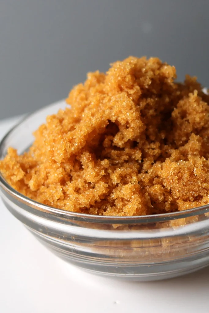 Bowl of homemade brown sugar on a white plate.