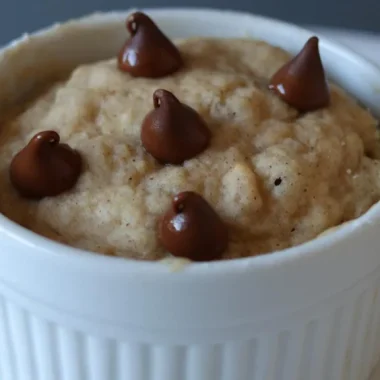 Single serving banana cake in a white ramekin
