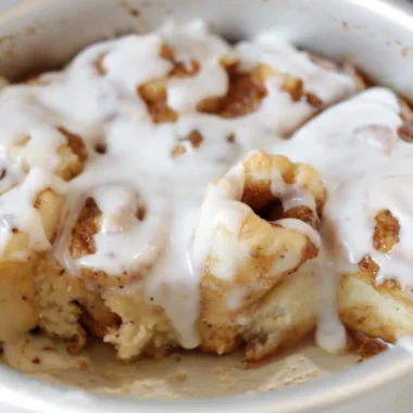 Round cake pan full of 2-ingredient dough cinnamon rolls