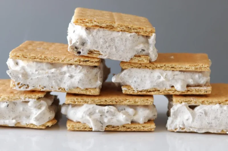 Stack of 3-ingredient cookies and cream ice cream sandwiches.