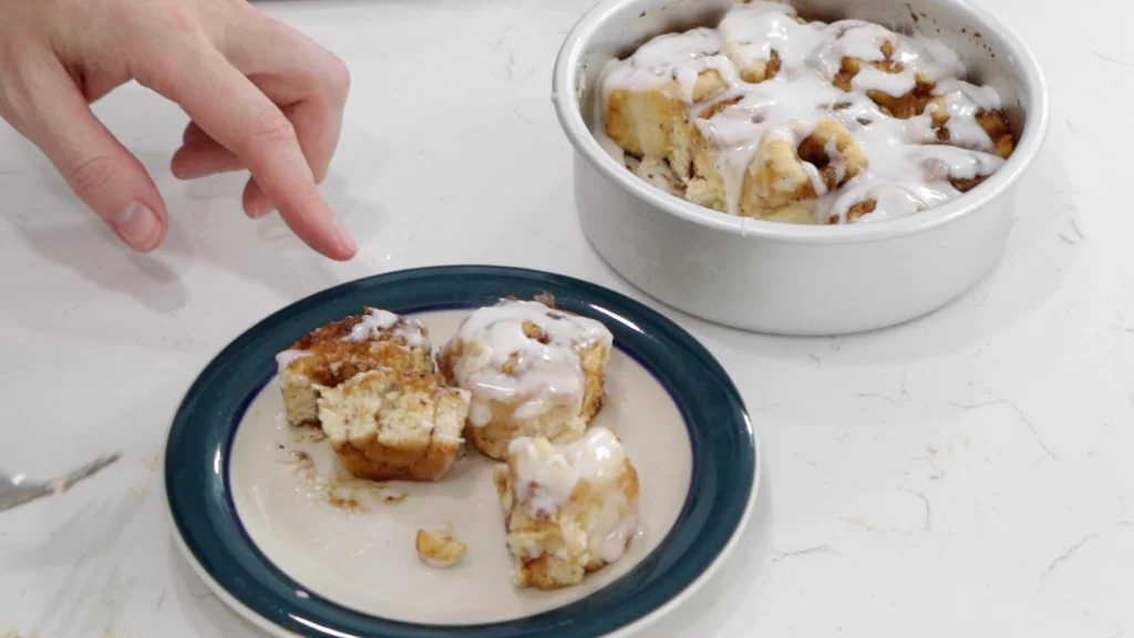 Cinnamon rolls on a small plate.