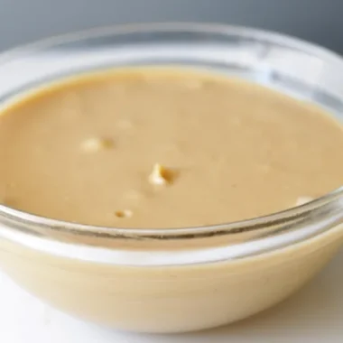 Bowl of creamy peanut butter.