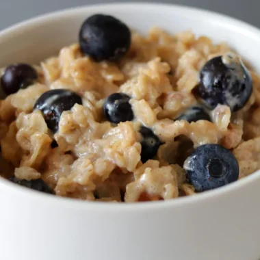 Bowl of homemade oatmeal with blueberries made on the stovetop