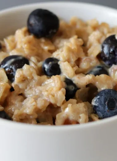 Bowl of homemade oatmeal with blueberries made on the stovetop