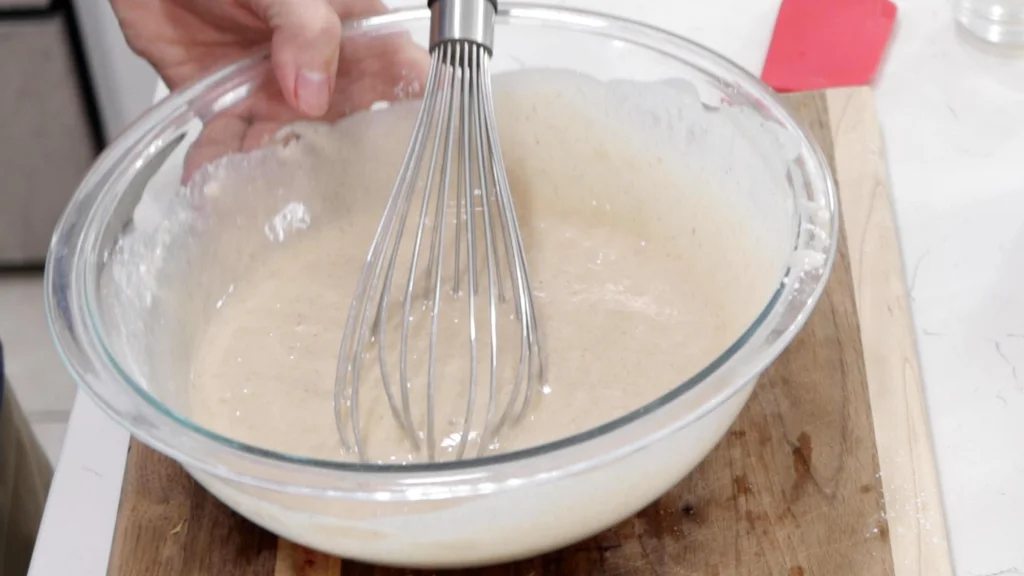 Peach cobbler batter in a bowl ready to be used.