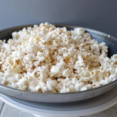 freshly popped popcorn in a saucepan